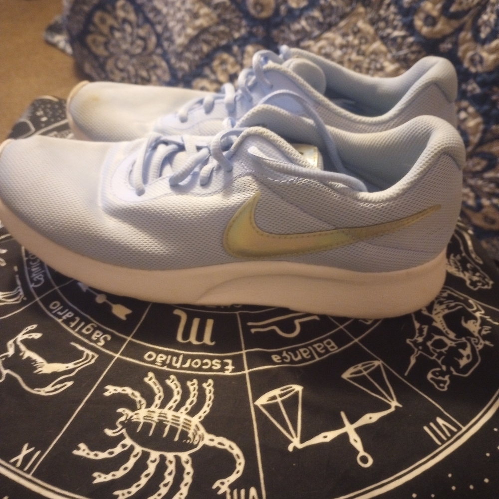 Nike Light Blue Sneakers with Gold Swoosh